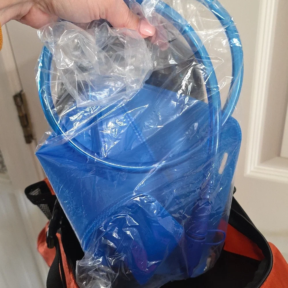 NWOT TOPI Orange Black Hydration Backpack Cooler Hiking Outdoor Travel​